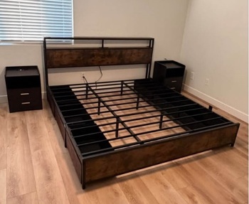 Real customer bedroom with assembled king bed and matching nightstands